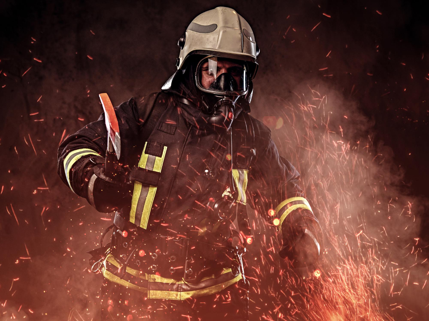 firefighter-dressed-uniform-oxygen-mask-holds-red-axe-standing-fire-sparks-smoke-dark-background (1)